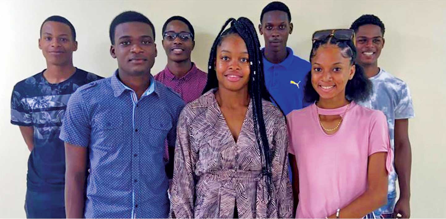 Some of the students who were awarded athletic scholarships to pursue studies in Jamaica