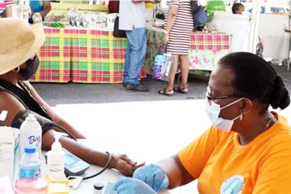 Health checkup at Caribbean Wellness Day festival.