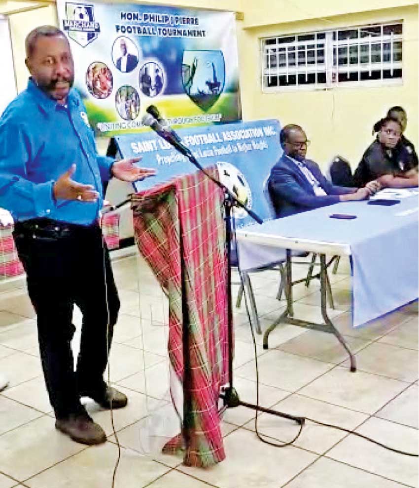 SLFA Inc. President Lyndon Cooper addresses the audience at the MFL media launch, with PM Phillip Pierre and MFL officials in attendance.