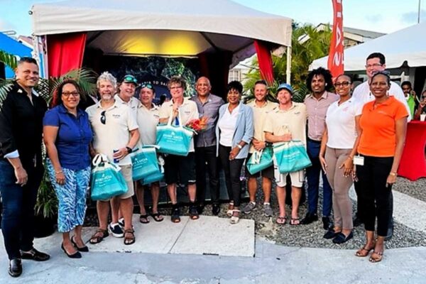 Malolo crew and ARC event representatives from Saint Lucia welcome the sailors to local shores.