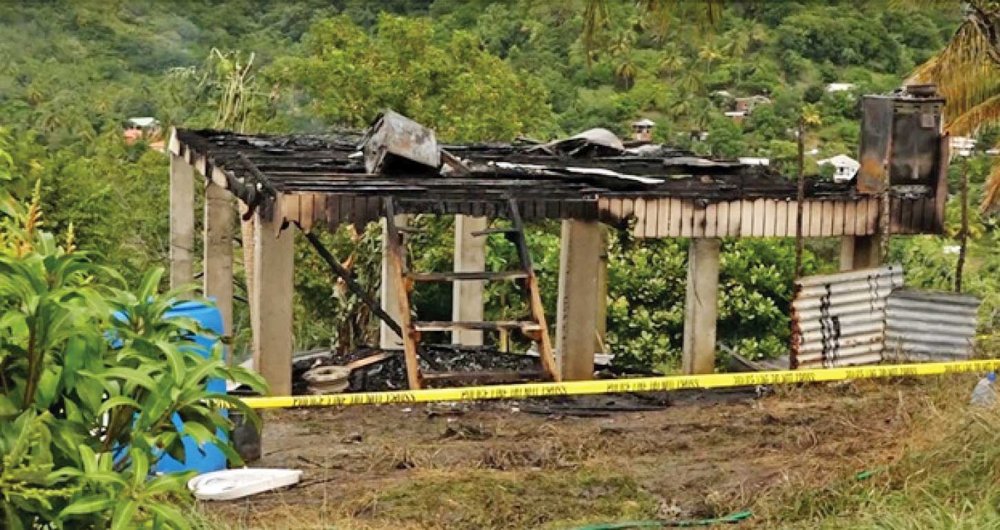 Remains of the burnt out dwelling house at La Caye , Dennery.