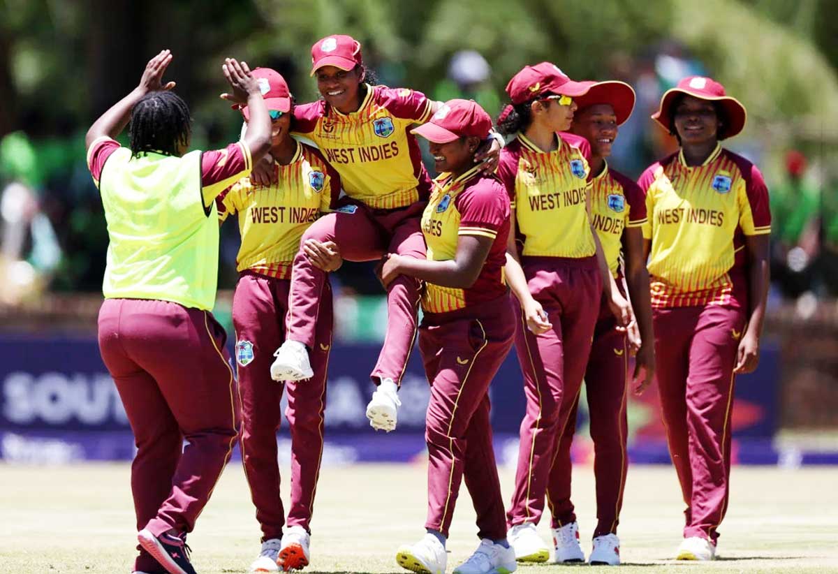 Zadia James celebrates with her team mates.