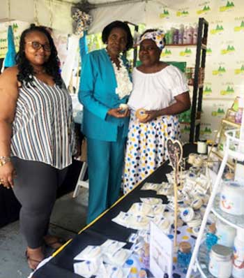 Commerce Minister Emma Hippolyte (centre) with representatives from small businesses.