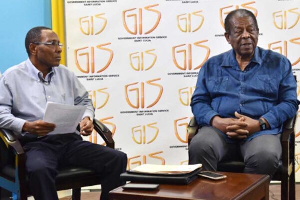 L to R: David Vitalis, public relations officer (PRO) of the Accession Committee and Sir Denis Byron, Chairman of the Accession Committee and former Chief Justice of the Caribbean Supreme Court and former President of the Caribbean Court of Justice.