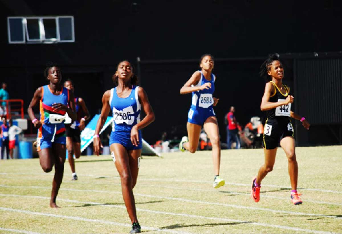Secondary school students compete at track meet.