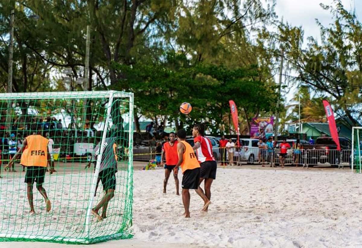 Action in beach football competition.