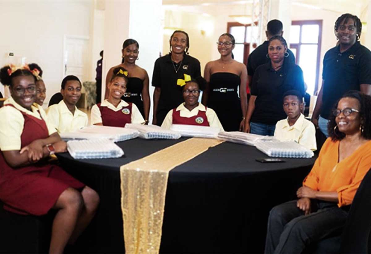 SCSS students and officials display donated supplies