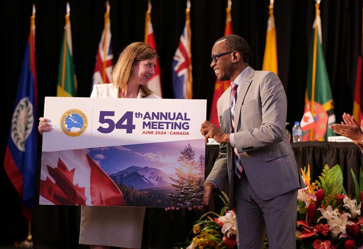 Honourable Philip J. Pierre, (second left) Prime Minister of Saint Lucia and outgoing Chairman of the Board of Governors of the Caribbean Development Bank, (CDB) handed over the Chairmanship to Canada with a symbolic presentation to Ms. Cheryl Urban, (far left) Canada’s Director General, Economic Development, at the Closing Ceremony of the Bank’s 53rd Annual Meeting in Saint Lucia on Wednesday June 21, 2023. Canada’s Minister of International Development, Honourable Harjit Sajjan, CDB’s Governor for Canada, has now assumed the role of Bank Chairman and the next Annual Meeting will be held in Canada in 2024. Ms. Urban, who served as Canada’s Temporary Alternate Governor at the 2023 Annual Meeting, accepted the mantel on Minister Sajjan’s behalf.