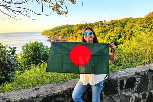 Najmun Nahar displaying Bangladeshi flag while in Saint Lucia