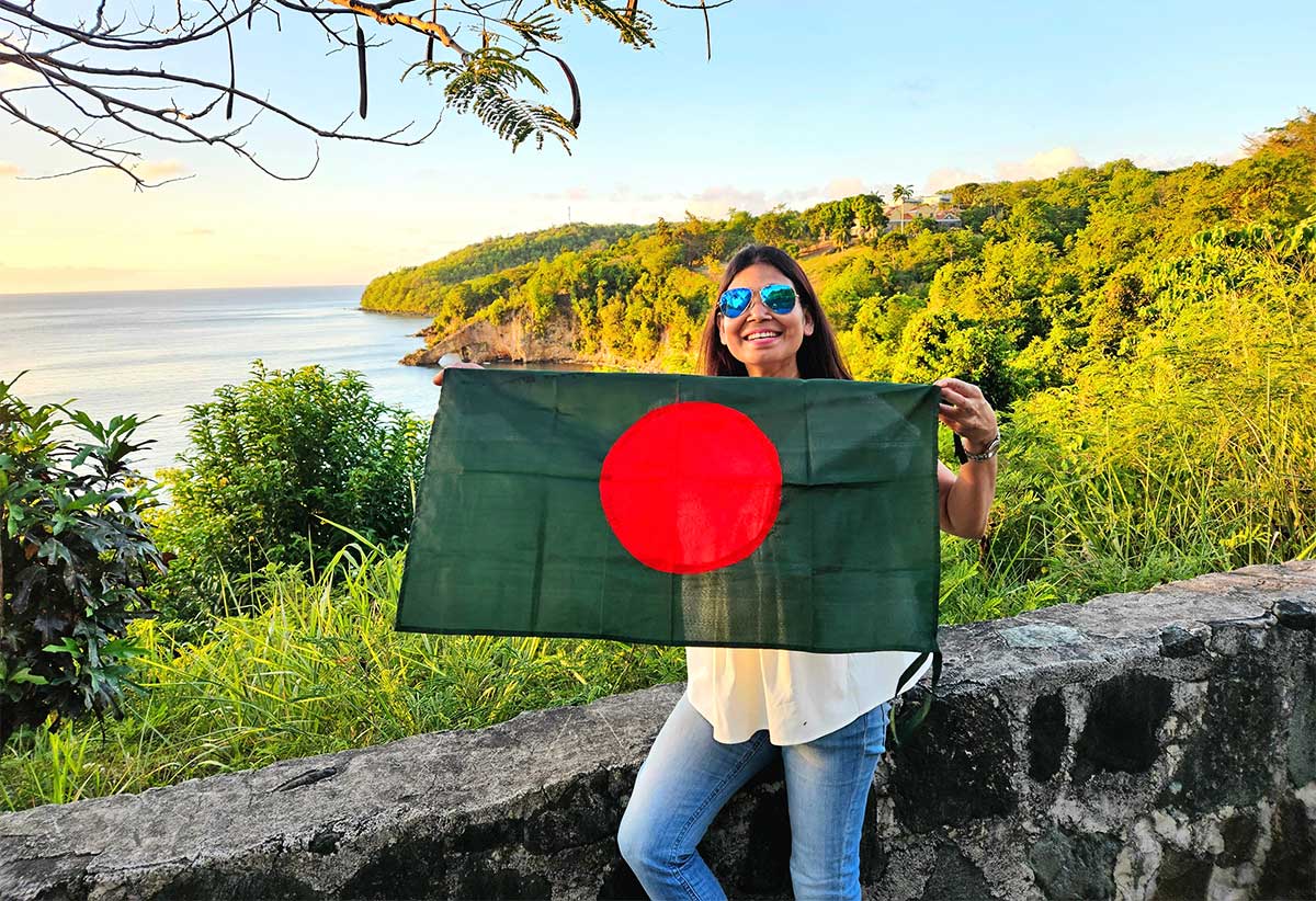 Najmun Nahar displaying Bangladeshi flag while in Saint Lucia