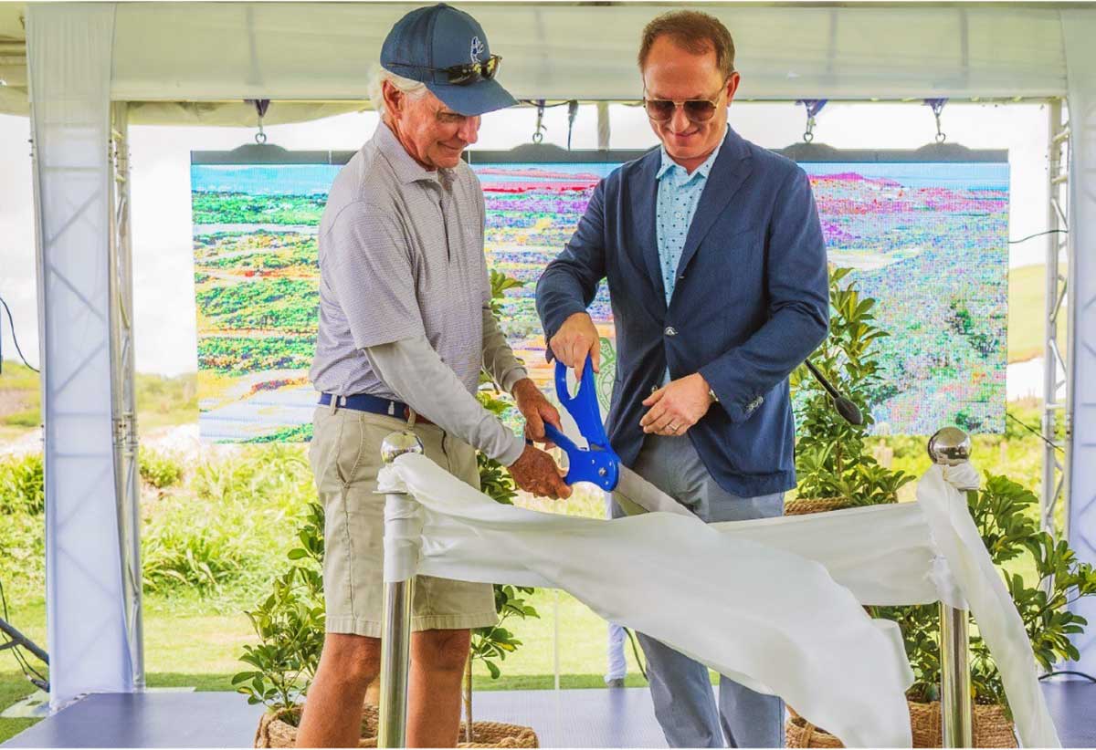 Ben Cowan Dewar (r) and Bill Coore performing the ceremonial ribbon cutting to officially open the golf course.
