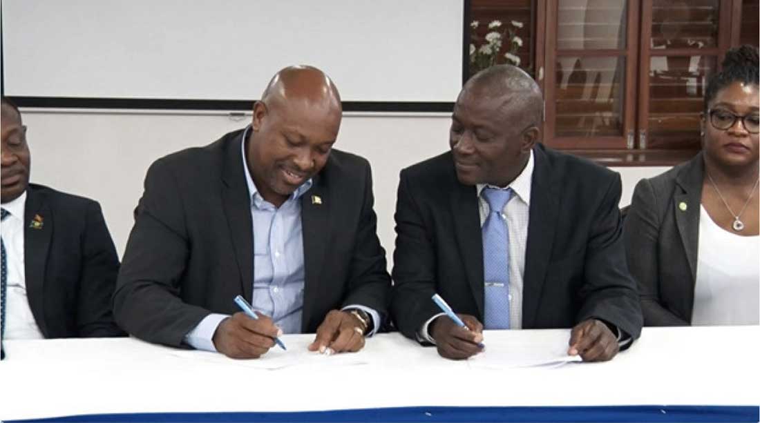 SVG’s Saboto Caesar and Saint Lucia’s Alfred Prospere signing the MOU 