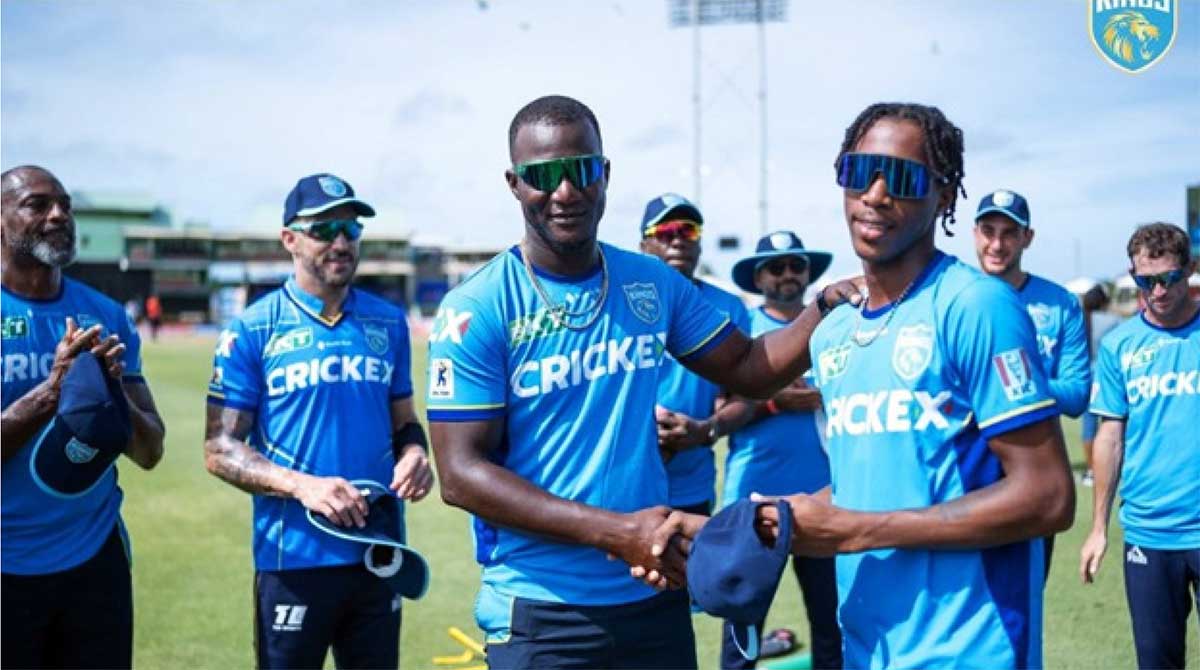 Mc Kenny Clarke receives his debut cap from SLK coach Daren Sammy