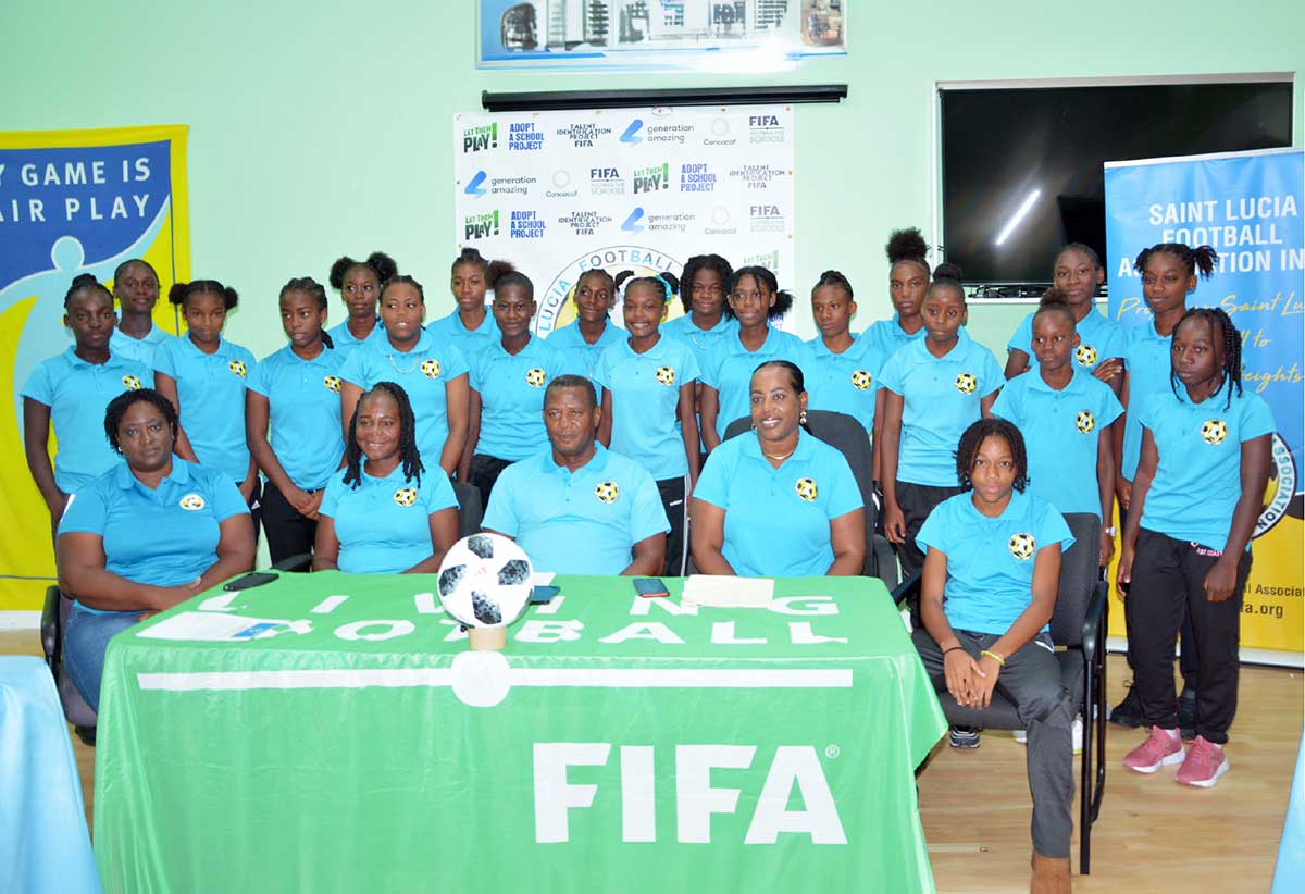 Saint Lucia’s National U-14 Girls team alongside technical unit staff [Photo credit : Dave Pascal]