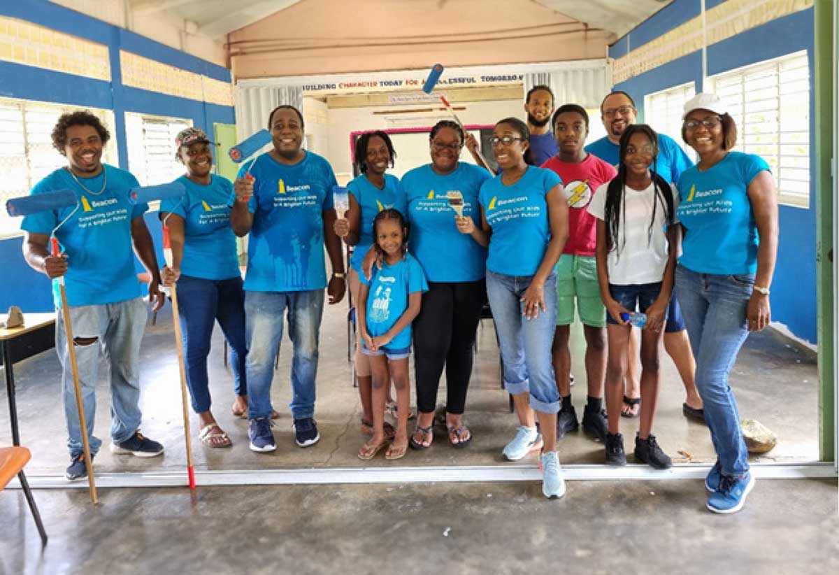 The dedicated team from Beacon St Lucia that selflessly contributed their time to repaint four classrooms at the Grand Riviere Primary School. 