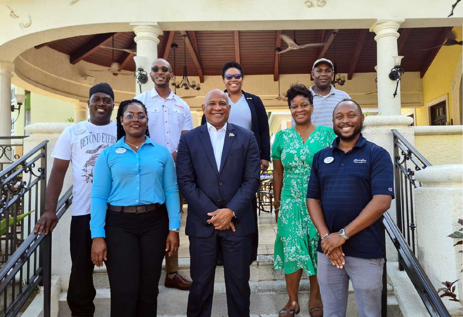 Deputy Prime Minister Dr Ernest Hilaire and SLTA CEO Lorine Charles-St. Jules meet with Saint Lucians working at Beaches Turks and Caicos