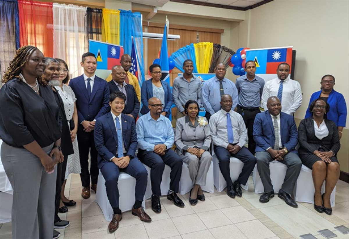 Mr. Danilel Lee, Head of the Taiwan Technical Mission (TTM) in Saint Lucia; Hon. Joachim Henry, Minister for Equity, Justice and Social Empowerment; Hon. Emma Hippolyte, Minister for Commerce, Manufacturing, Business Development, Cooperatives and Consumer Affairs; Hon. Alfred Prospere, Minister for Agriculture, Fisheries, Food Security and Rural Development; and Mr. Guillaume Simon, Permanent Secretary in the Ministry of External Affairs, International Trade and Civil Aviation; join others at the opening ceremony for a photo op.