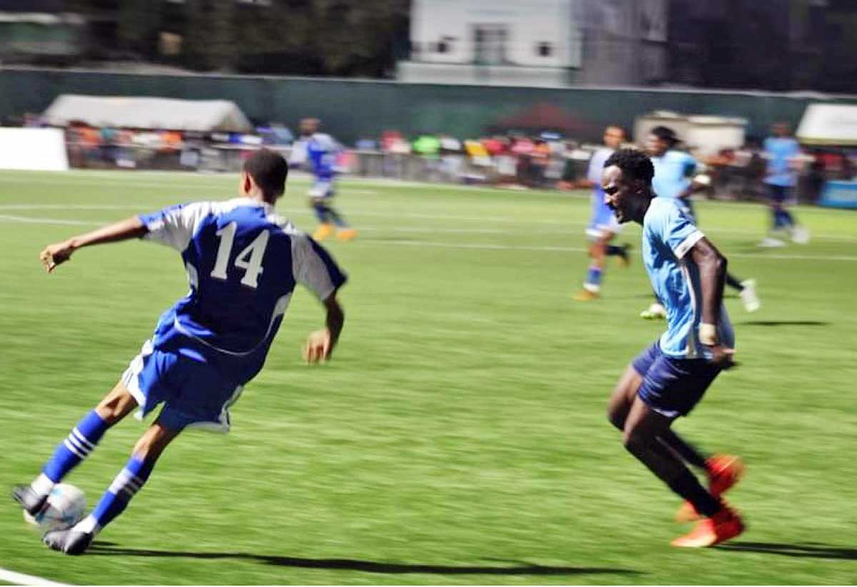 On-field action at Dennery