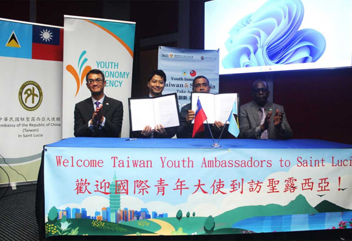 (from left to right) -- His Excellency Peter Chia-Yen Chen, Taiwan’s Ambassador to Saint Lucia; Mr. Daniel Lee, Head of Taiwan Technical Mission (TTM); Mr. Thomas Leonce, Chairperson, Youth Economy Agency (YEA); and Prime Minister Hon. Philip J. Pierre at the signing of the Memorandum of Understanding at the Youth Forum.
