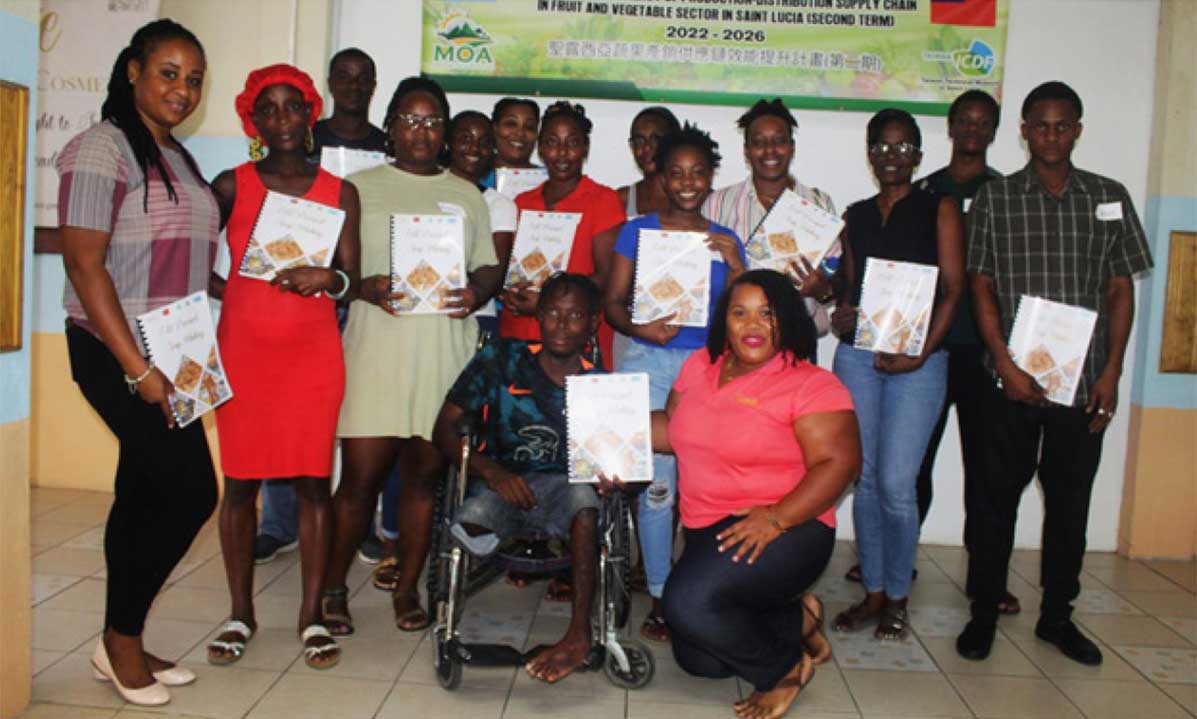 Facilitator Kishma Louis (kneeling in front row) with the workshop participants on day one of the workshop.